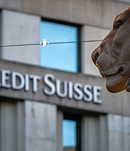Credit Suisse said it would borrow up to 50 billion Swiss francs ($53.7 billion) from the Swiss National Bank, taking advantage of a lifeline late March 15 after its stock crashed as much as 30%.
Mandatory Credit:	Fabrice Coffrini/AFP/Getty Images