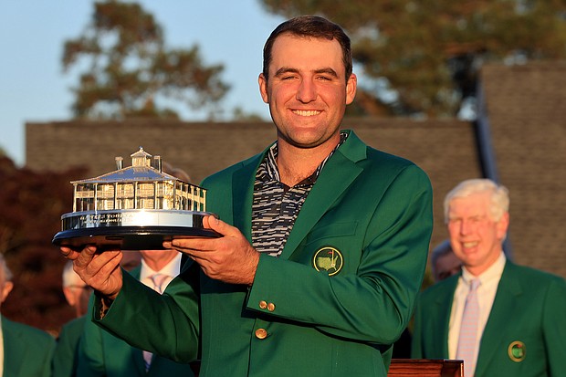 Scottie Scheffler earned the right to decide the menu for next year's Masters Champions Dinner. Scheffler poses with the Masters trophy during the Green Jacket Ceremony after winning the Masters at Augusta National Golf Club in April, 2022.
Mandatory Credit:	David Cannon/Getty Images