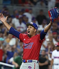 Edwin Díaz celebrates against the Dominican Republic.
Mandatory Credit:	Al Bello/Getty Images