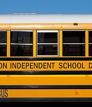 The leaders of the Houston Independent School District, the largest school district in Texas, will be replaced by a new board appointed by the state Commissioner of Education, the district said on March 15. A Houston Independent School District bus is seen here on March 4.
Mandatory Credit:	Aaron M. Sprecher/AP