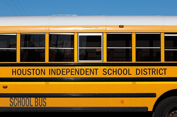 The leaders of the Houston Independent School District, the largest school district in Texas, will be replaced by a new board appointed by the state Commissioner of Education, the district said on March 15. A Houston Independent School District bus is seen here on March 4.
Mandatory Credit:	Aaron M. Sprecher/AP