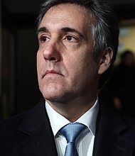 Former Donald Trump lawyer Michael Cohen walks out of a Manhattan courthouse after testifying before a grand jury on March 13, 2023 in New York City.
Mandatory Credit:	Spencer Platt/Getty Images