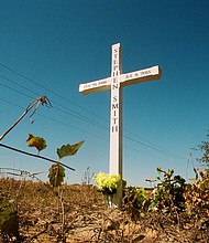 A roadside wooden cross marks the spot where Stephen Smith's body was found on Sandy Run Road in rural Hampton County, South Carolina.
Mandatory Credit:	Richard Burkhart/Savannah Morning News/USA Today Network