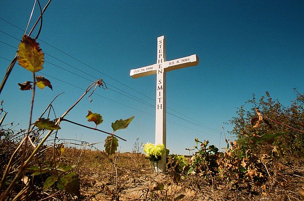 A roadside wooden cross marks the spot where Stephen Smith's body was found on Sandy Run Road in rural Hampton County, South Carolina.
Mandatory Credit:	Richard Burkhart/Savannah Morning News/USA Today Network