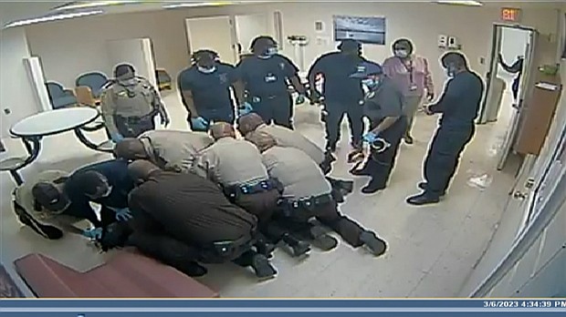 Surveillance video shows Irvo Otieno being pinned to the floor by multiple security officers at a Virginia state mental health facility in the moments leading up to his death earlier this month.
Mandatory Credit:	Dinwiddie County Commonwealth's Attorney