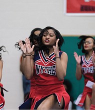 George Wythe High School cheerleaders entertain several hundred spectators at Huguenot High School with loud cheers and high-flying leaps and dance moves at Richmond Public Schools’ 2023 All City Cheer Explosion on March 25. Martin Luther King Jr. Middle School took home the Middle School Team performance championship, and River City Middle School and Armstrong High School won Solo performance championships.