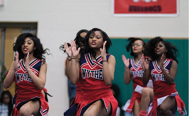George Wythe High School cheerleaders entertain several hundred spectators at Huguenot High School with loud cheers and high-flying leaps and dance moves at Richmond Public Schools’ 2023 All City Cheer Explosion on March 25. Martin Luther King Jr. Middle School took home the Middle School Team performance championship, and River City Middle School and Armstrong High School won Solo performance championships.