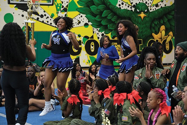 A thrilled John Marshall High School cheering squad hears their name announced as the winners of the team championship at the 2023 All City Cheer Explosion. The squad, known as the Icettes, are coached by Shaia Scott, a former Armstrong High School cheerleader. The team was named the Grand Champs in the Portsmouth Battle Competition and placed first in Nationals in the North Carolina Stomp-N-Shake Competition.