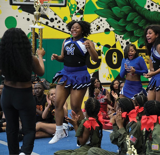 A thrilled John Marshall High School cheering squad hears their name announced as the winners of the team championship at the 2023 All City Cheer Explosion. The squad, known as the Icettes, are coached by Shaia Scott, a former Armstrong High School cheerleader. The team was named the Grand Champs in the Portsmouth Battle Competition and placed first in Nationals in the North Carolina Stomp-N-Shake Competition.