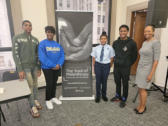 TSOP Chicago hosts a panel discussion on inspiring future philanthropists with Chicago youth at the Chicago Cultural Center.  (From Left) Jahkil Jackson, Village Leadership Academy, Joshua Dorden, De La Salle Institute, Randi Thomas, Village Leadership Academy, Jevon Hobbs, Whitney Young H.S./ Village Leadership Academy Alumnae and panel moderator:  Alleson Knox, Interim Director of Youth Development for Thrive Chicago. Image credit Chicago African Americans in Philanthropy.