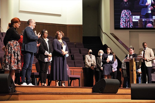 From left, Richmond City Council members Stephanie A. Lynch, Andreas D. Addison, Ann-Frances Lambert and Ellen F. Robertson address members of RISC at Saint Paul’s Baptist Church on March 28 during the RISC Nehemiah Action Assembly.