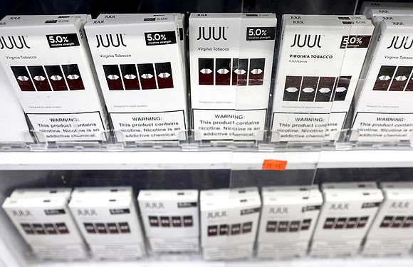 Juul Labs, the e-cigarette maker, is paying $462 million to six US states and DC in the largest multi-state settlement …