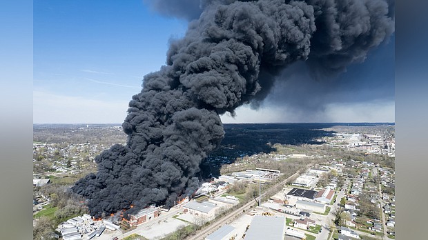 A large fire burns at a recycling facility in Richmond, Indiana, on Tuesday.
Mandatory Credit:	Kevin Shook/Global Media Enterprise