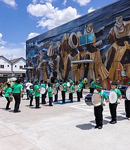 The Atherton Elementary School drumline performs during a celebration of the Julia C. Hester House 80th anniversary.