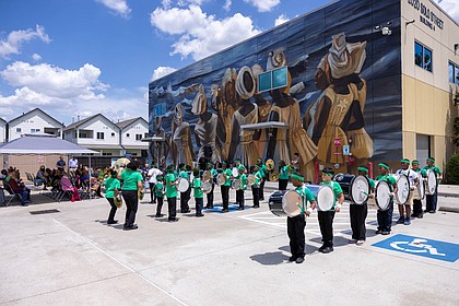The Atherton Elementary School drumline performs during a celebration of the Julia C. Hester House 80th anniversary.