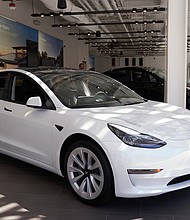 A Tesla Model 3 on display at the Tesla store in Santa Monica, California. The Model 3 is one of the cars eligible for the new EV tax credits.
Mandatory Credit:	Allison Dinner/Getty Images