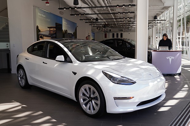 A Tesla Model 3 on display at the Tesla store in Santa Monica, California. The Model 3 is one of the cars eligible for the new EV tax credits.
Mandatory Credit:	Allison Dinner/Getty Images