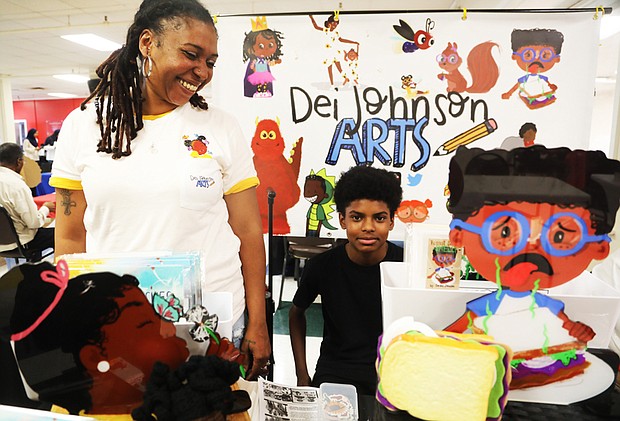 Deidra Johnson, a children’s book illustrator and author, participates in the African-American Book Festival with her son, Josiah Johnson, 13, who was on hand to assist her. The April 15 festival was presented by the Virginia Business Expo at Richmond Diversity Center, 1407 Sherwood Ave.