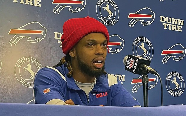 Buffalo Bills safety Damar Hamlin speaks to reporters Tuesday at the NFL football team’s facility in Orchard Park, N.Y. He said he plans to resume his football career after being cleared to play more than four months after going into cardiac arrest and needing to be resuscitated on the field during a game in Cincinnati.