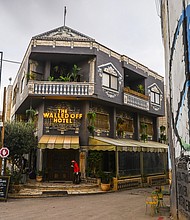 A view of Banksy's 'The Walled Off Hotel' next to the Israeli separation barrier in Israeli-occupied Bethlehem on December 28, 2022.
Mandatory Credit:	Beata Zawrzel/NurPhoto/Getty Images