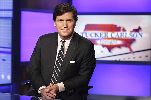 Fox News and Tucker Carlson, the right-wing personality who hosted the network's highly rated 8pm hour, have severed ties, the network said in a stunning announcement on April 24.
Mandatory Credit:	Richard Drew/AP