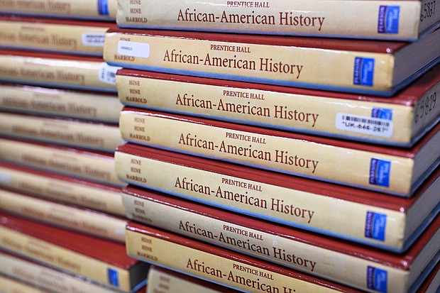 Books are piled up in the classroom for students taking AP African-American Studies at Overland High School on November 1, 2022 in Aurora, Colorado.
Mandatory Credit:	RJ Sangosti/MediaNews Group/The Denver Post/Getty Images