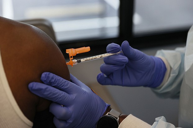 Florida Surgeon General Dr. Joseph Ladapo altered a government analysis last year to suggest mRNA Covid-19 vaccines pose a significant health risk to men ages 18 to 39, Politico reported Monday.
Mandatory Credit:	Joe Raedle/Getty Images