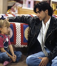 Ashley Olsen and John Stamos in "Full House" in 1992.
Mandatory Credit:	ABC Photo Archives/Disney General Entertainment Content/Getty Images