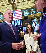 Speaker of the House Kevin McCarthy speaks with Peter Giacchi, executive floor official with Citadel, on the floor of the New York Stock Exchange on Monday, April 17th.