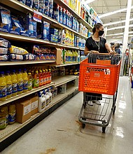 The US economy has slowed in the first quarter of this year, A customer shops at a store on March 14, in Miami, Florida.
Mandatory Credit:	Joe Raedle/Getty Images