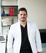 Dr. Christian Arroyo, MD, founder of Arroyo Plastic Surgery