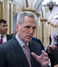 Speaker of the House Kevin McCarthy talks with reporters at the Capitol in Washington, April 28, 2023.
