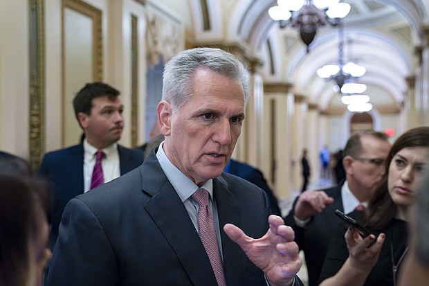 Speaker of the House Kevin McCarthy talks with reporters at the Capitol in Washington, April 28, 2023.