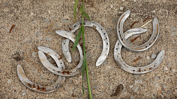 Discarded horseshoes are seen here in the barn area during the morning training for the Kentucky Derby at Churchill Downs on April 29. Officials from the Churchill Downs racetrack have described the recent deaths of four horses as "unacceptable."
Mandatory Credit:	Andy Lyons/Getty Images