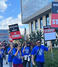 TV and film writers are fighting to save their jobs from AI. They won't be the last. Picketing has begun in front of Netflix in Hollywood, California on May 2.
Mandatory Credit:	Stephanie Elam/CNN