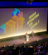 pg. 14  Tyler Perry and TIFF CEO Cameron Bailey photo by Dwight Brown