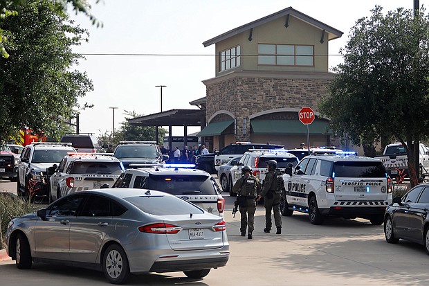 Emergency personnel work the scene of a shooting at Allen Premium Outlets_Stewart  F. House/Getty Images