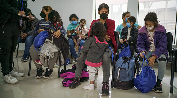 Migrants who had been sent across the border to Ciudad Juárez, across from El Paso, waited at the Juarez Migrant Assistance Center in 2021. Credit: Paul Ratje for The Texas Tribune