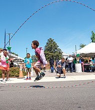 Julius Dengel, 7, jumps Double Dutch during the Rho Eta Omega Chapter of Alpha Kappa Alpha Sorority and the Sarah Garland Jones Center for Healthy Living’s “Passport to Wellness,” a day of health-centered information and nutrition on April 29. The event, at 2900 Nine Mile Road, featured yoga, food, information on health for men and women, financial literacy and more.