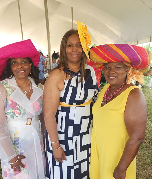 Several hundred people turned out last Saturday for the benefit Derby Day Party in Richmond to enjoy music, games, food and the 149th running of the Kentucky Derby and raise money for the Professionals Reaching Out to the Community (PROC). Leaders of the event included from left, Charmayne B. Vincent, chair of PROC; and the two co-chairs of the event, Janet Hawkes-Pleasants and Natalie Smith. Location: Bon Secours Training Center on Leigh Street. PROC is best known for sponsoring The Beautillion, an etiquette and leadership program for male high school students.