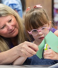 Harris County Department of Education Occupational Therapist Tammy Hillegeist works with Roslyn Black, a student in Cy-Fair ISD, April 11, 2023.