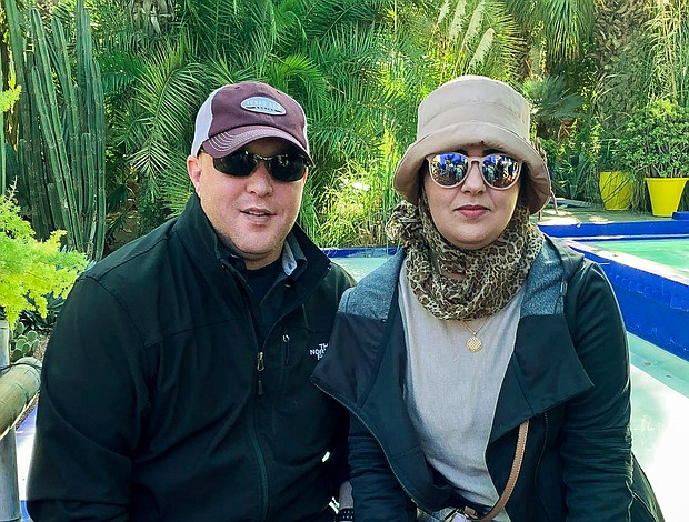 Hicham Al-Hazbari, left, and his wife, Najah Ibrahimi, after moving to the United States.