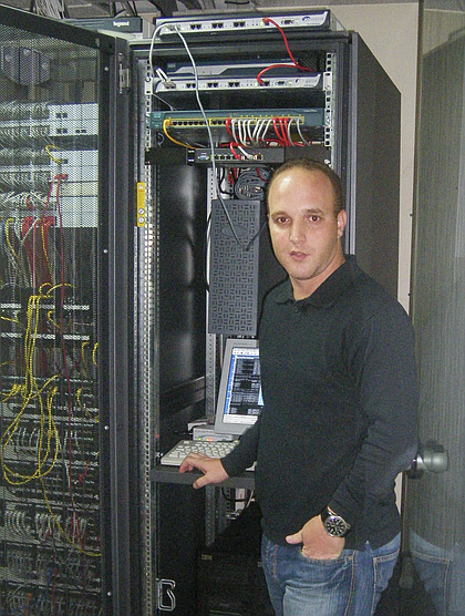 Hicham Al-Hazbari photographed while working as a computer technician in Morocco.