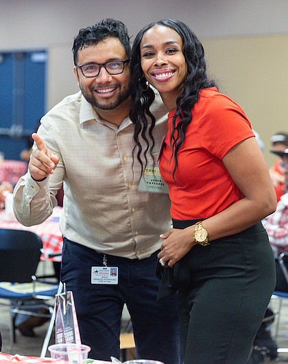 CASE for Kids Site Coordinator Keanda Fuller poses with colleague after winning the Director’s Award