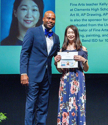 Kelly Chen poses for a photo at a Scholastic Art & Writing Awards ceremony at the Wortham Theater Center, May 3, 2023.