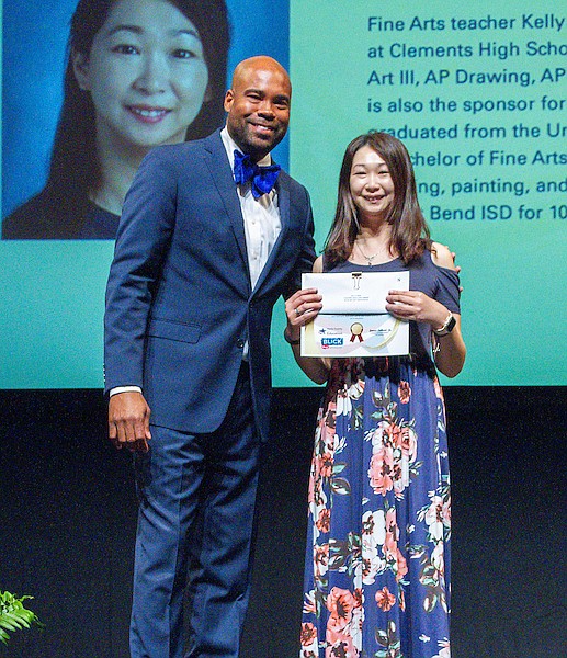 Kelly Chen poses for a photo at a Scholastic Art & Writing Awards ceremony at the Wortham Theater Center, May 3, 2023.