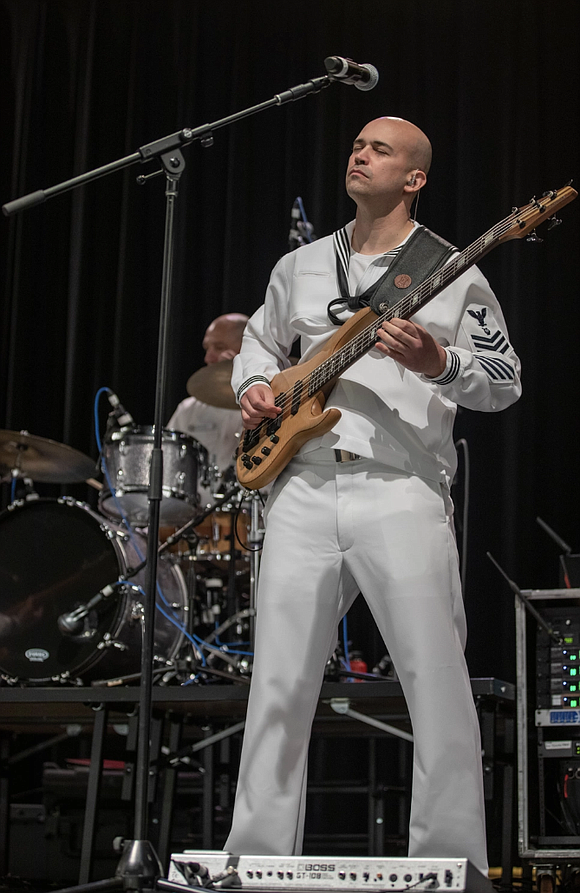 Musician 1st Class James Randorff, from Houston, assigned to Navy Band Great Lakes performs at Central Visual and Performing Arts …