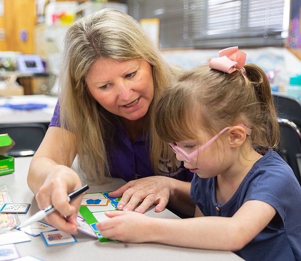 Harris County Department of Education Occupational Therapist Tammy Hillegeist works with Roslyn Black, a pre-kinder student in Cy-Fair ISD, April 11, 2023.