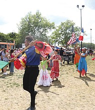 Poised and pretty the Panamanian Traditional Dance Group of RVA was among many performers May 6 during the 22nd annual Que Pasa Festival on Brown’s Island.