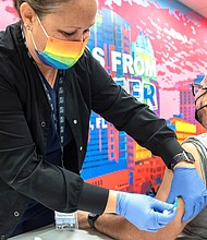 Nurse Kerri Phithibeault gives Danny Garcia an mpox vaccination in Orlando, Florida, in August 2022. The CDC is raising the alarm about the potential risk for new cases of mpox, previously known as monkeypox, to emerge this summer.
Mandatory Credit:	Willie J. Allen Jr./Orlando Sentinel/Getty Images